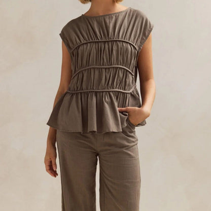 Emie Daly Sleeveless Peplum Blouse