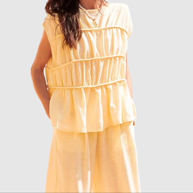 Emie Daly Sleeveless Peplum Blouse